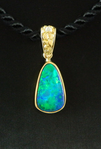 Opal and Diamond Pendant in 18kt Gold Opal and Diamond Pendant in 18kt Gold